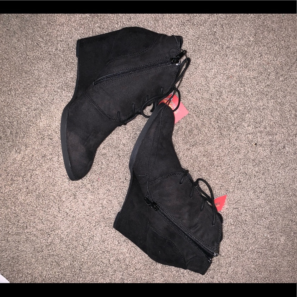 Black wedge booties